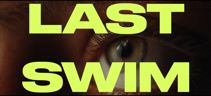a close up of a person's eye with the words'last swim '