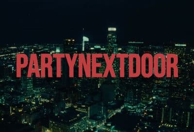 a city at night with the words partynextdoor over it