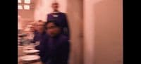 a blurry photo of two people in a room