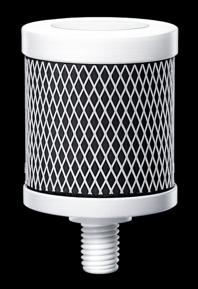 a close up of a black and white object on a black background