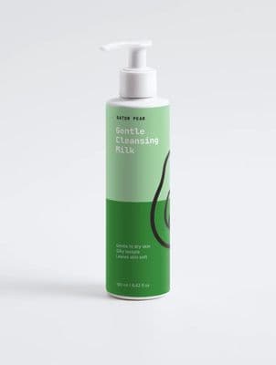 Green and white Gator Pear cleansing milk pump bottle photographed against a clean light gray studio background.
