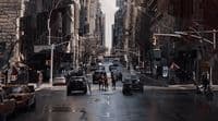 a city street filled with lots of traffic