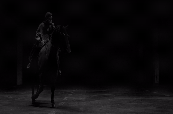 a man riding on the back of a horse