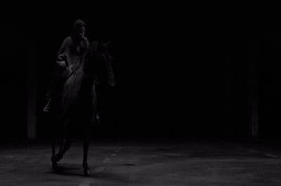 a man riding on the back of a horse