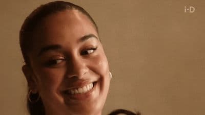 a woman with a smile on her face
