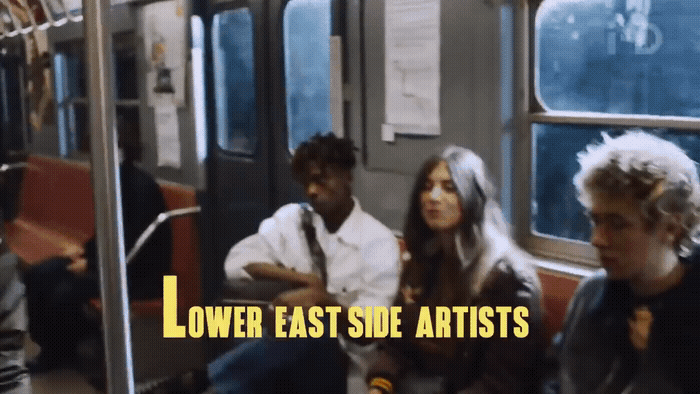 a group of people sitting on a train next to each other