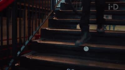 a person walking up a flight of stairs