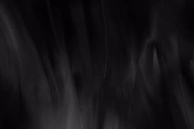 a black and white photo of a blurry background