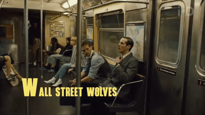 a group of people sitting on a subway train