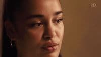 a close up of a person with a nose piercing