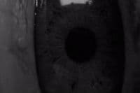 a black and white photo of an eye