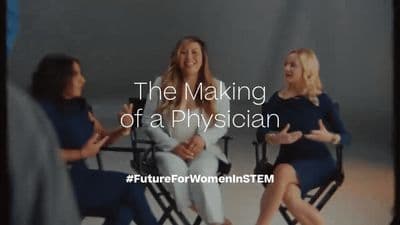 a group of women sitting in chairs talking to each other