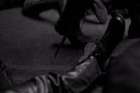 a black and white photo of a pair of shoes