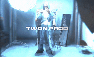 a person standing in a room with a microphone