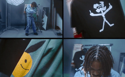 a person with dreadlocks standing in a room