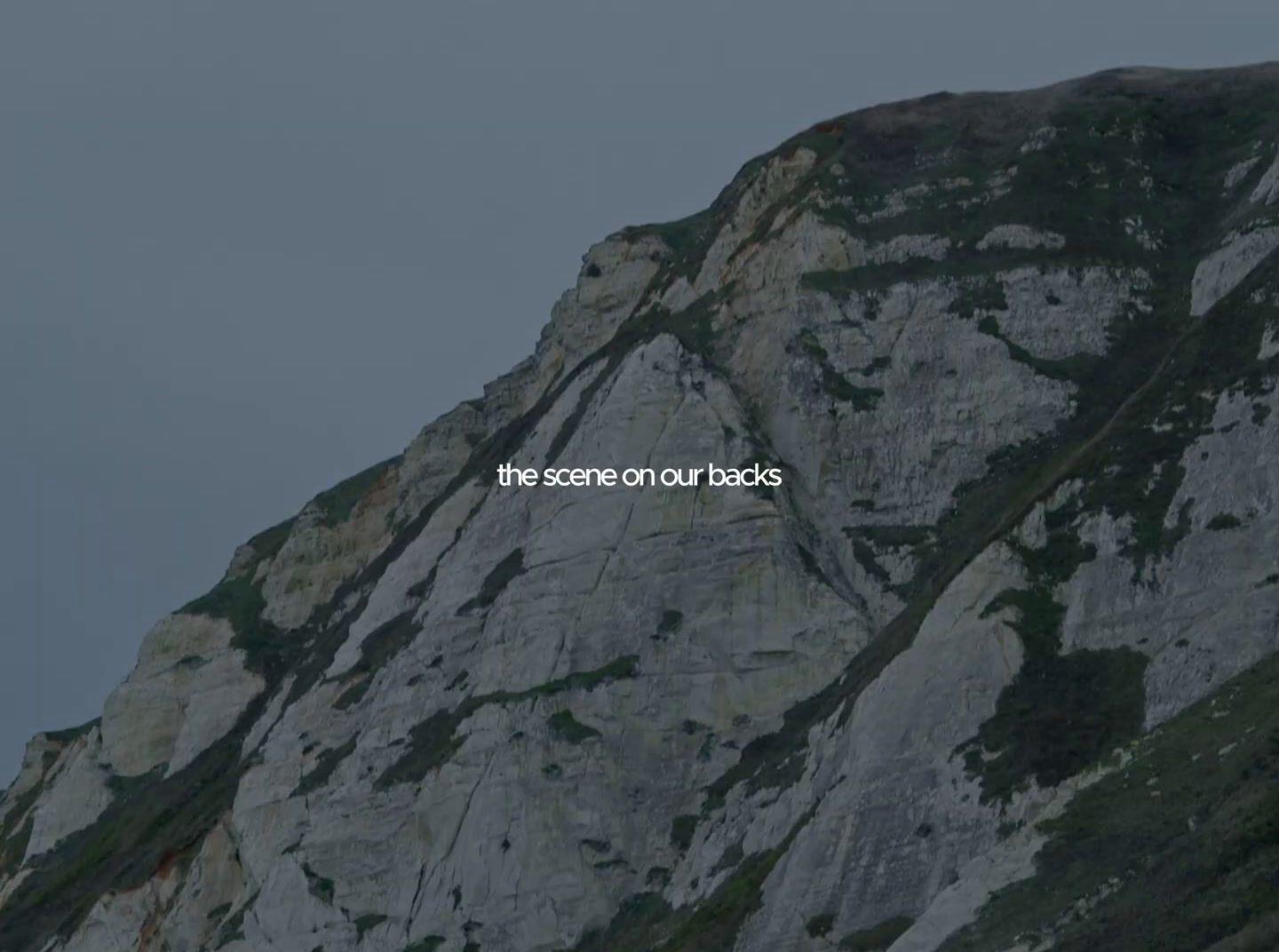 a mountain with a message written on it