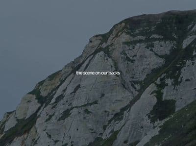a mountain with a message written on it