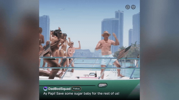 a group of people standing on top of a boat