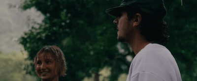 a man and a woman standing next to each other