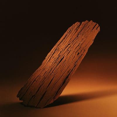 a piece of wood sitting on top of a table