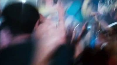 a blurry photo of a crowd of people