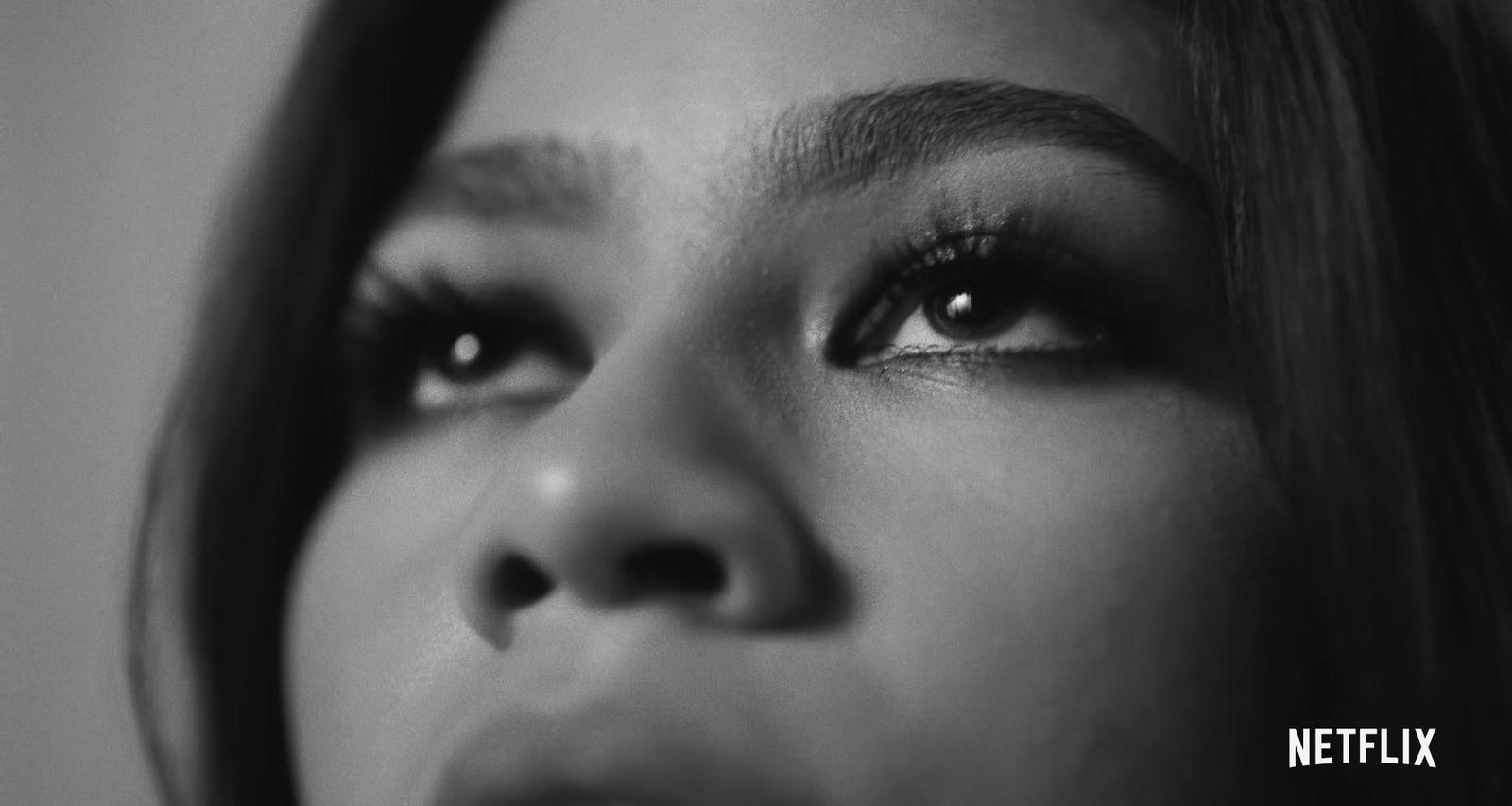 a black and white photo of a woman's face
