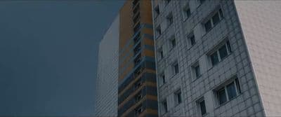 a tall building with a sky background