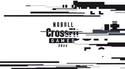 a black and white photo of a cross game logo