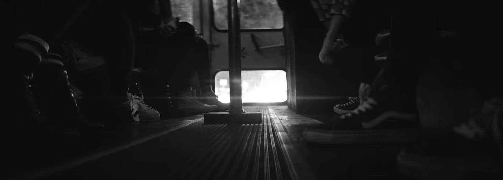 a black and white photo of the inside of a bus