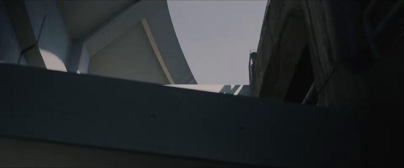 a close up of a building with a sky in the background
