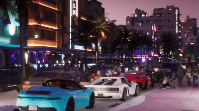 a city street filled with lots of traffic at night