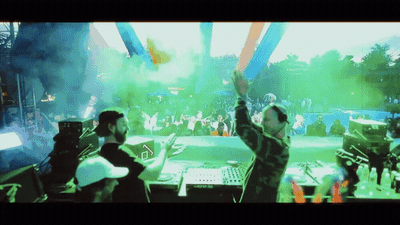 a group of people standing on top of a stage