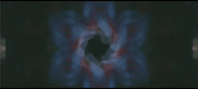 a blurry image of a circular object in the dark