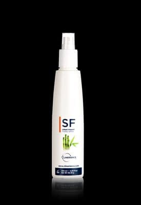 a bottle of shampoo on a black background