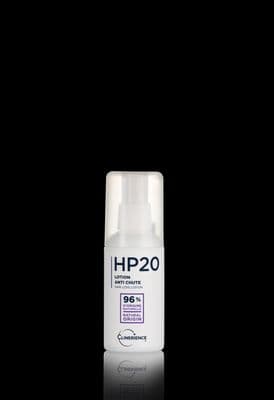 a bottle of deodorant on a black background