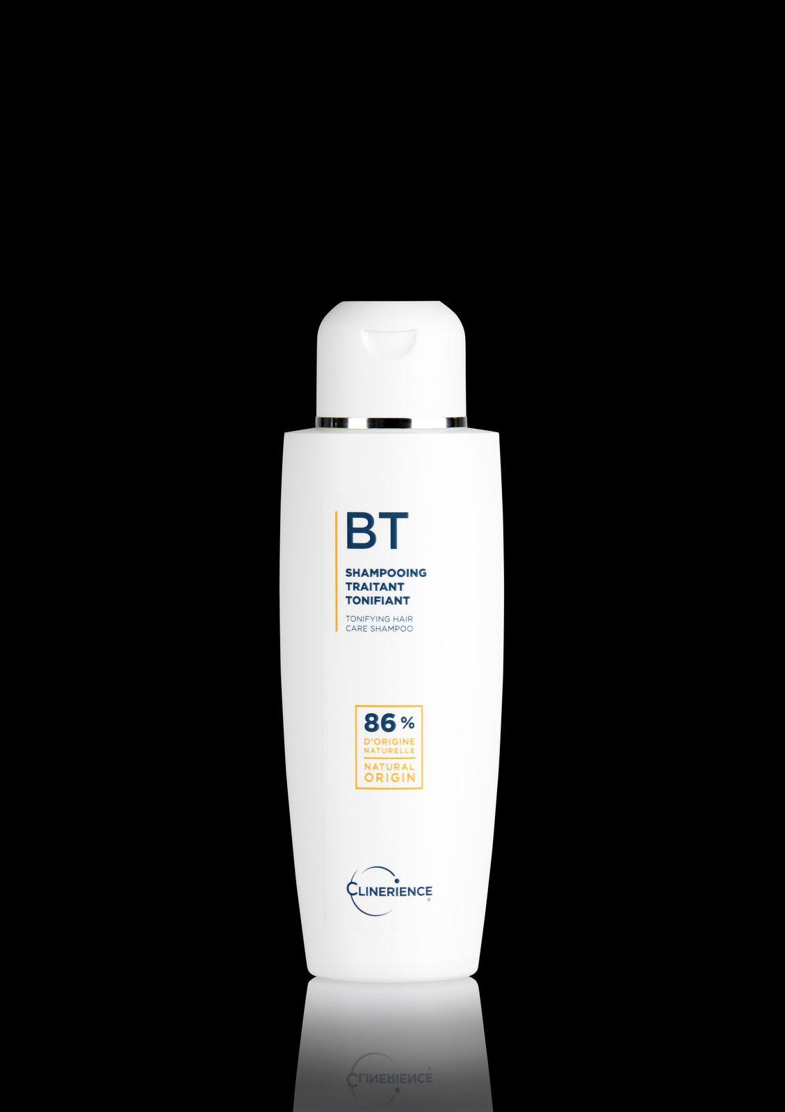 a bottle of lotion on a black background