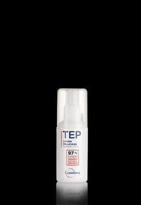 a bottle of deodorant on a black background