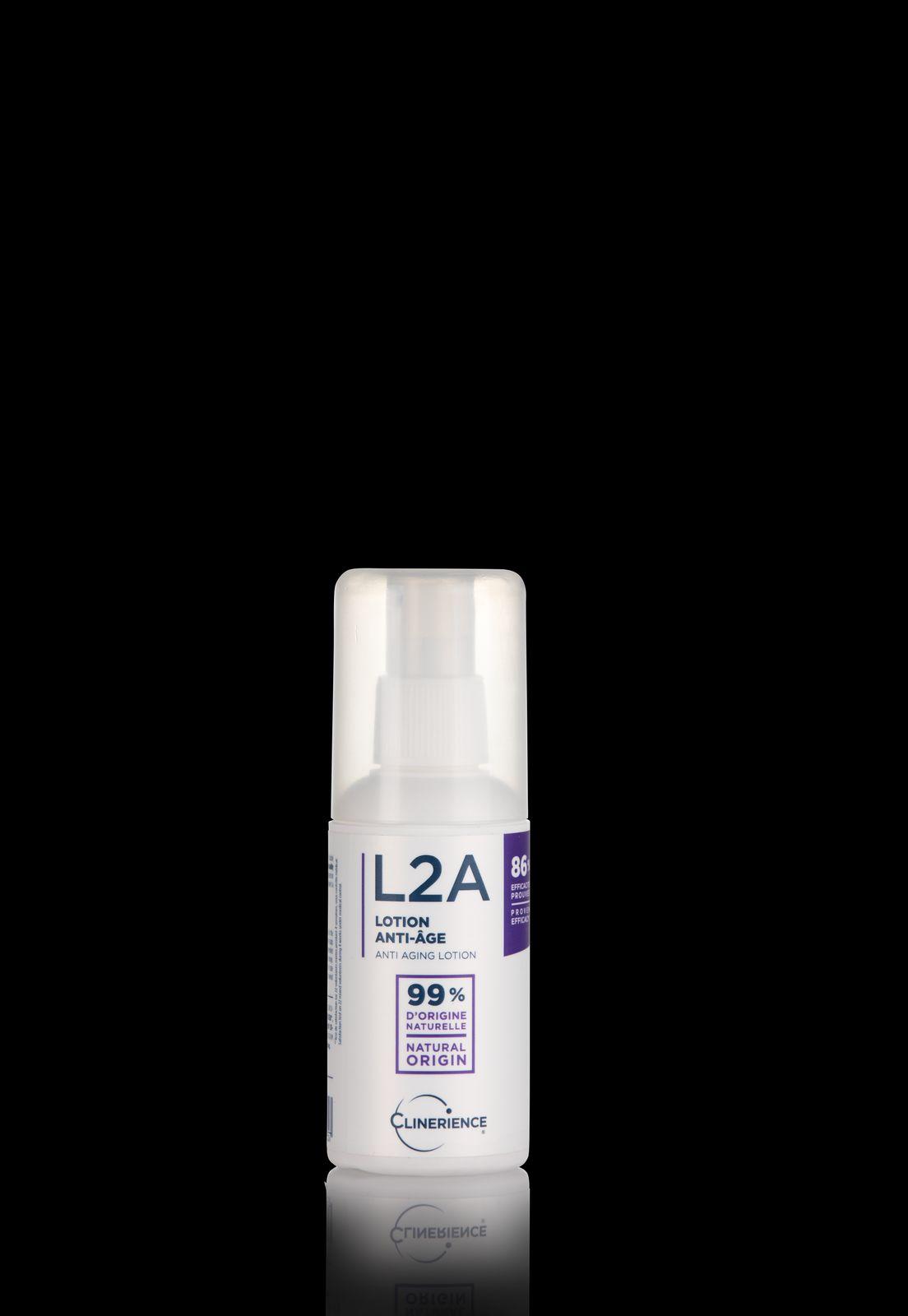 a bottle of deodorant on a black background