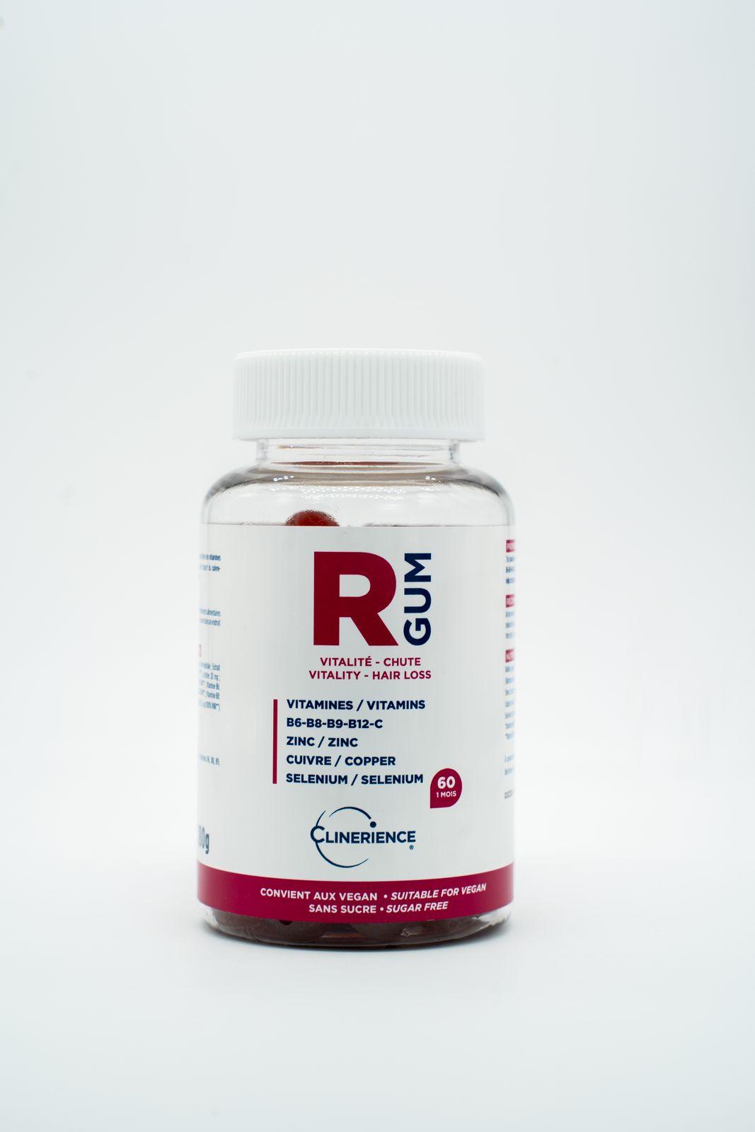 a close up of a bottle of pills on a white background