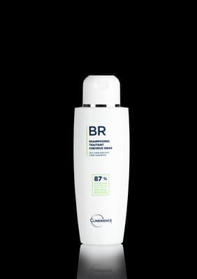 a bottle of shampoo on a black background