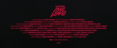 the back of a black and red poster