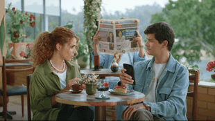 a man and a woman sitting at a table