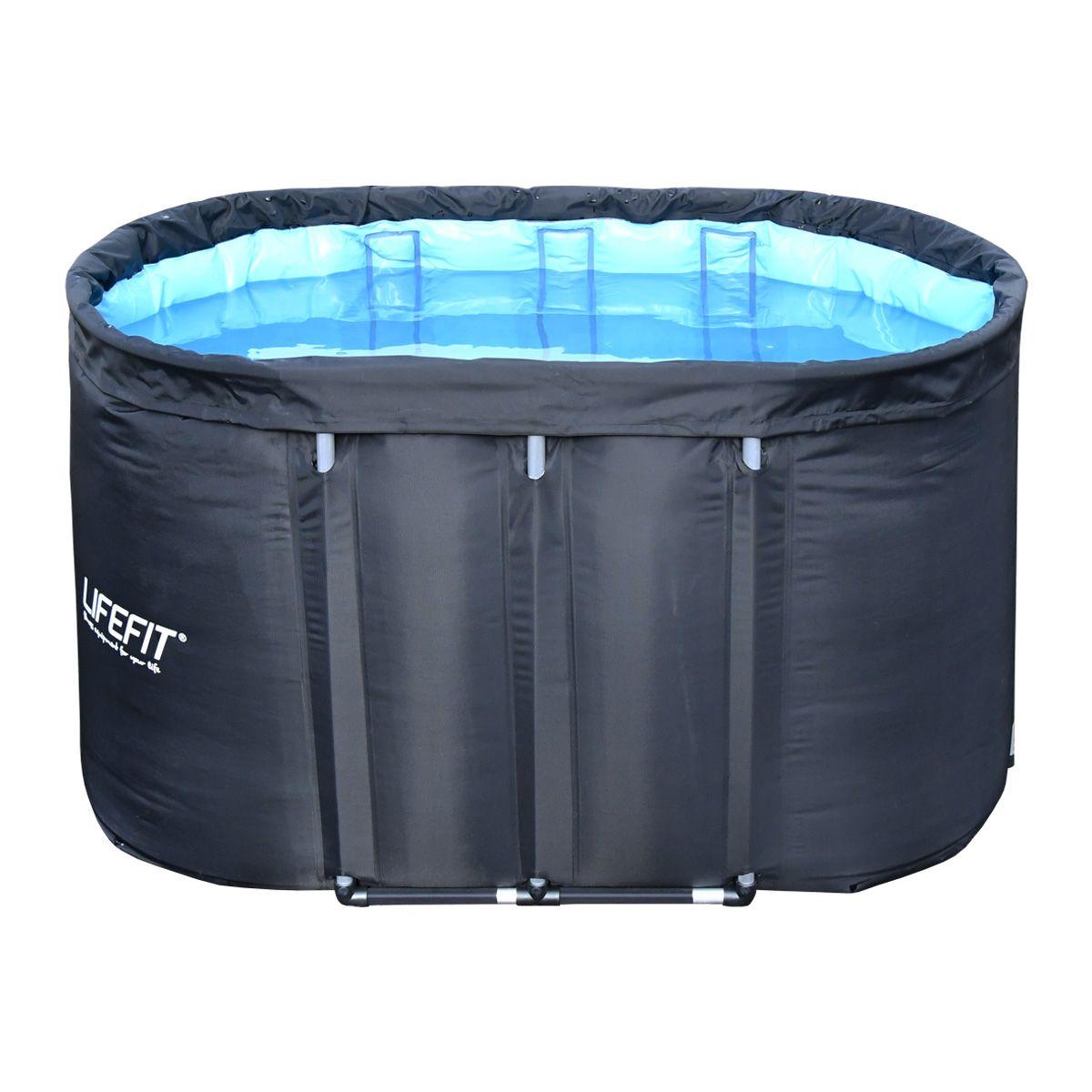 a large inflatable swimming pool with a blue cover
