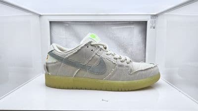 a pair of nike sneakers in a display case