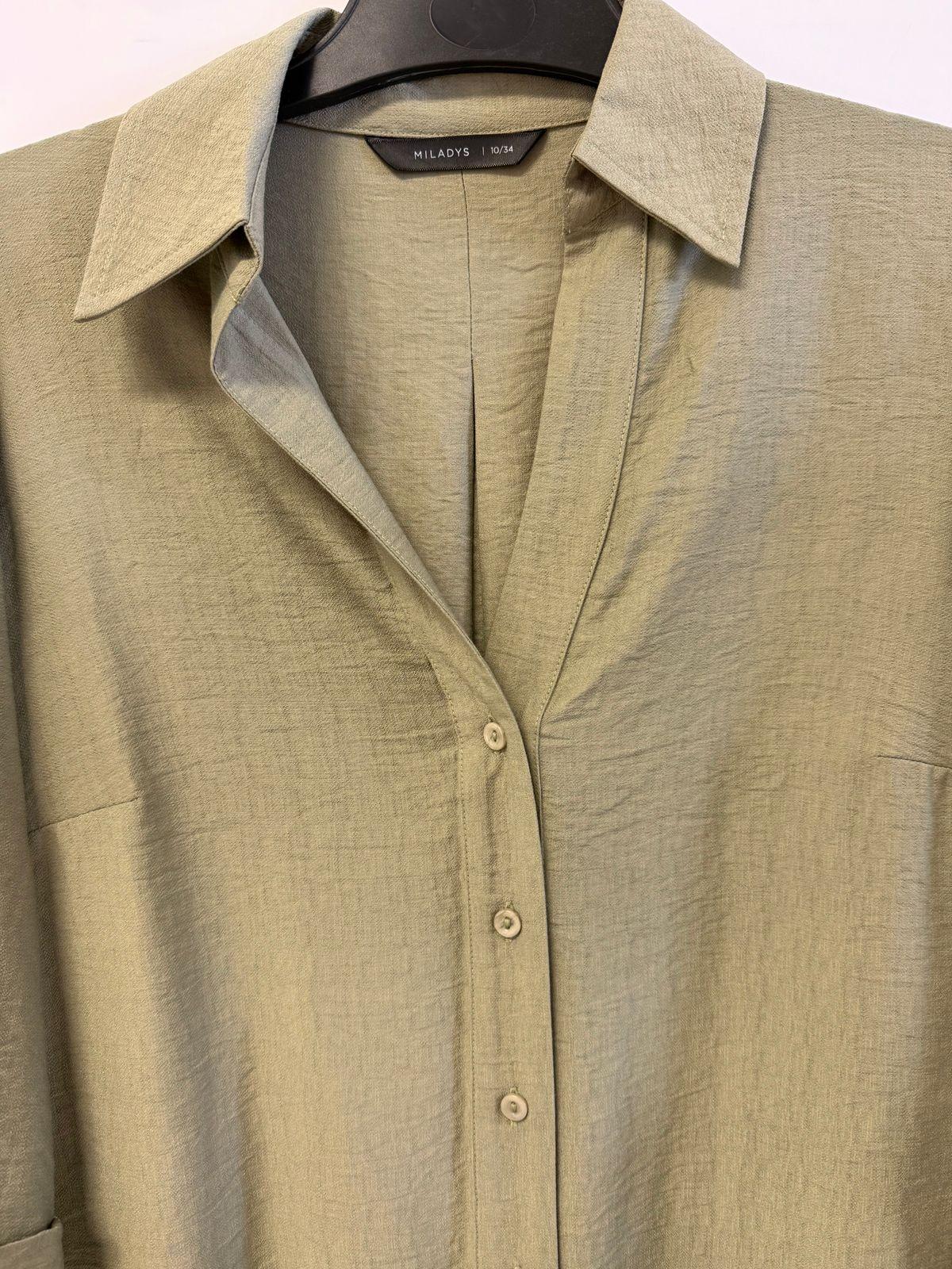 a close up of a shirt on a hanger