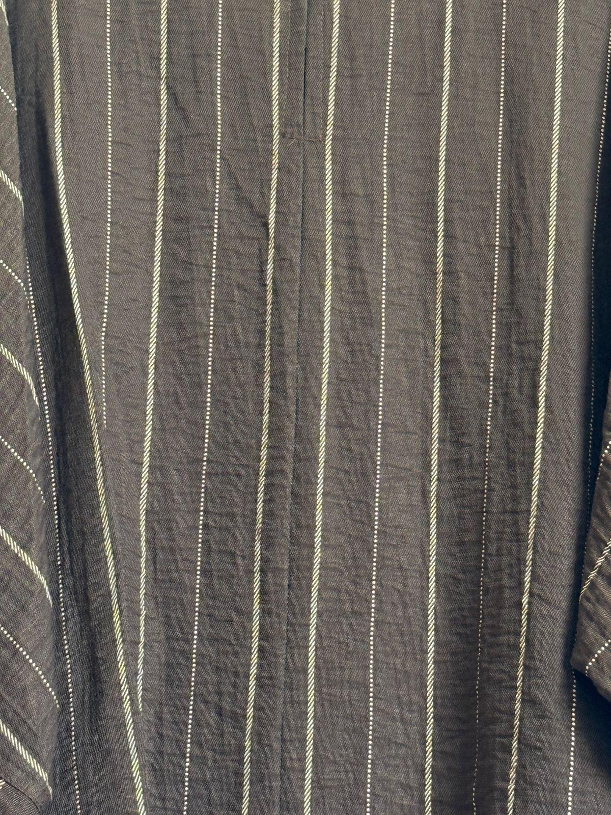 a close up of a shirt on a hanger