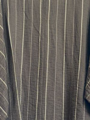 a close up of a shirt on a hanger