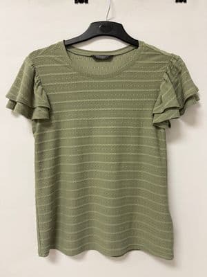 a green shirt hanging on a hanger
