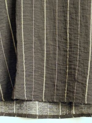 a close up of a piece of cloth with lines on it