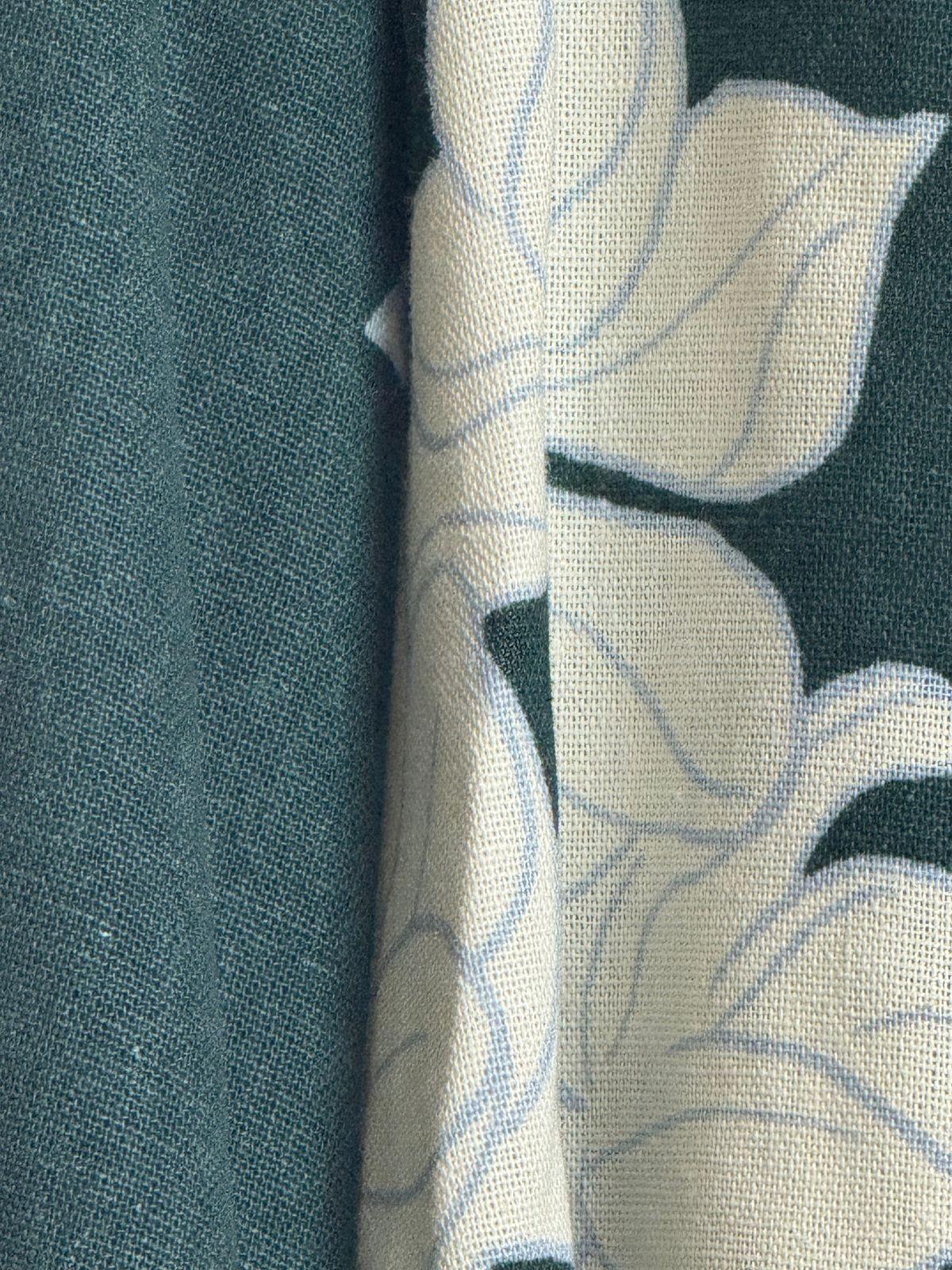 a close up of a fabric with a flower pattern